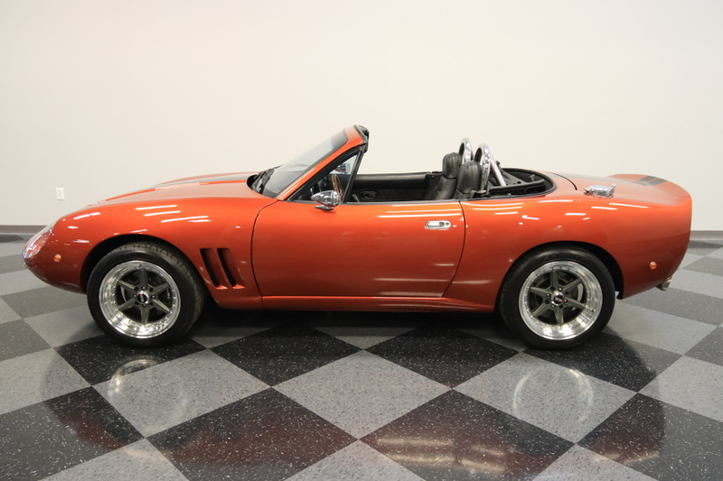 Illustration for article titled At $26,995, Is This Custom 1990 V8 Mazda Miata A Total Work Of NART?